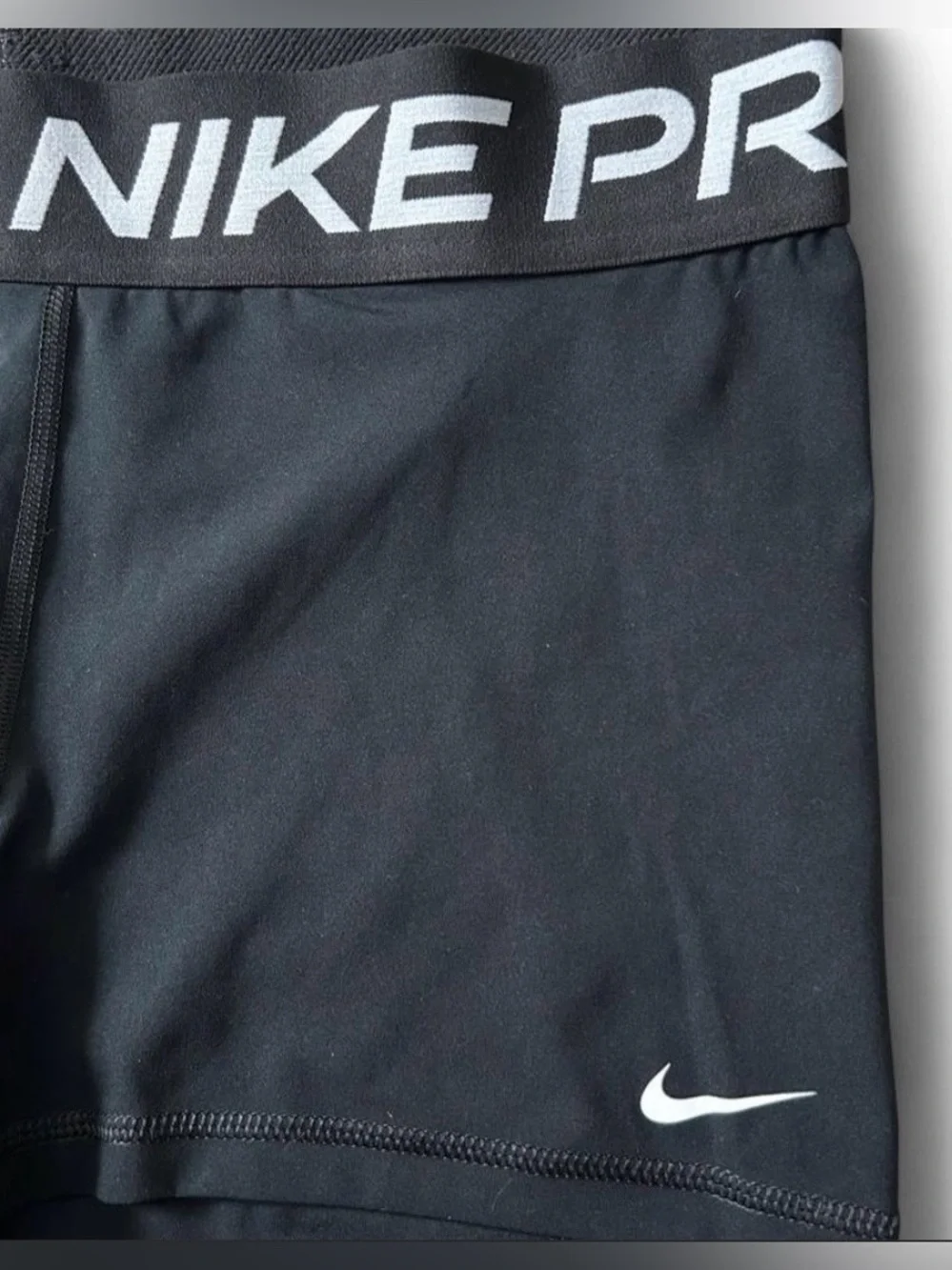 Nike Pro Women's Black Athletic Shorts with Branded Waistband